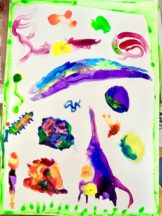 A sheet of painted marks inside a lime green border